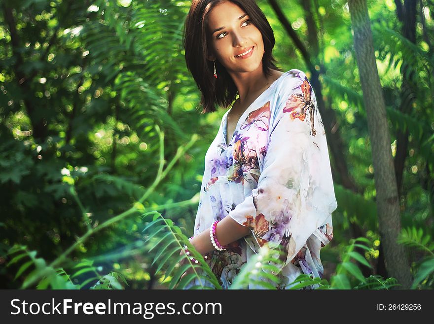 Beautiful Woman Walking In Tropical Forest