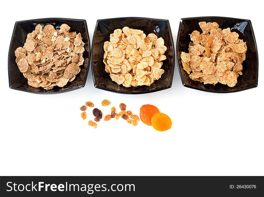 Three bowls of different cereal