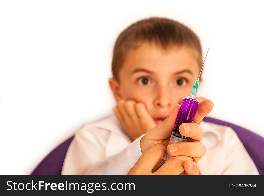 A child afraid of vaccine on a white background. A child afraid of vaccine on a white background