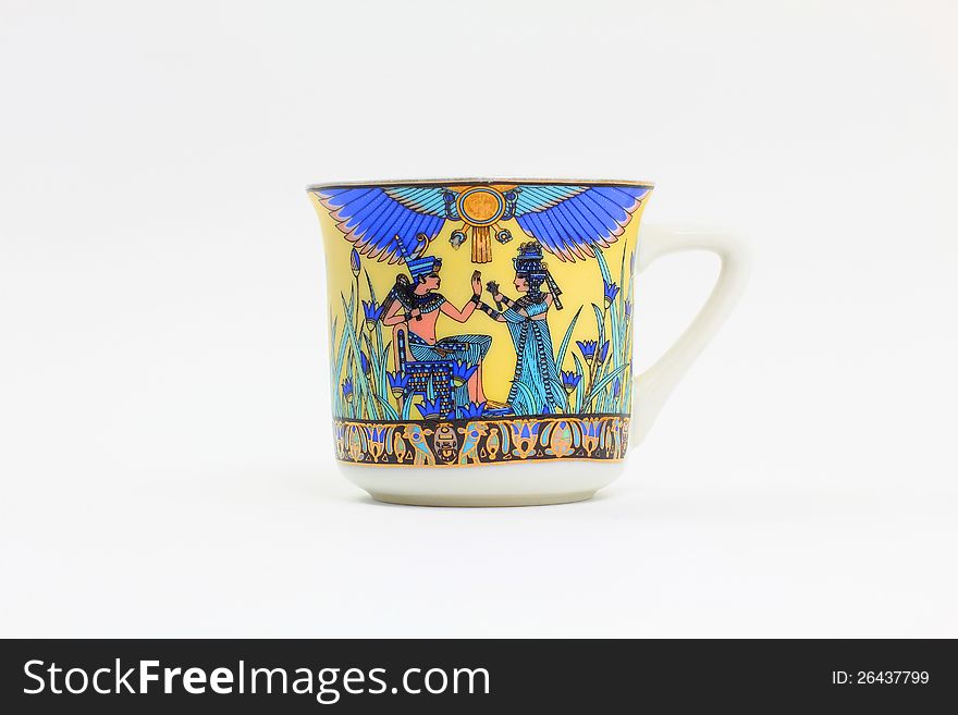 An Arabic cup of coffee painted in an Egyptian scheme. The scheme depicts Pharaonic times. An Arabic cup of coffee painted in an Egyptian scheme. The scheme depicts Pharaonic times.