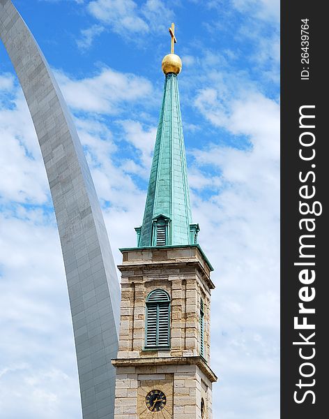 The Gateway Arch and the old Basilica Cathedral in St. Louis, Missouri. The Gateway Arch and the old Basilica Cathedral in St. Louis, Missouri