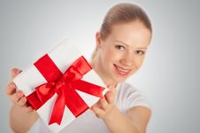 Beautiful Woman With A Gift With Red Ribbon Beautiful Woman With A Gift With Red Ribbon