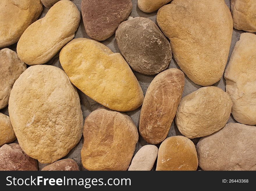 A wall with stones.