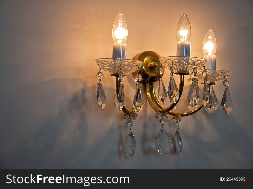 Classical Style Old Beautiful Crystal Chandelier on the wall. Classical Style Old Beautiful Crystal Chandelier on the wall