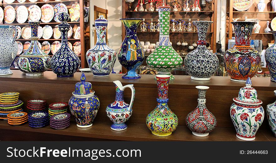 Colorful sales display of hand-painted vases and plates from Turkey. Colorful sales display of hand-painted vases and plates from Turkey.