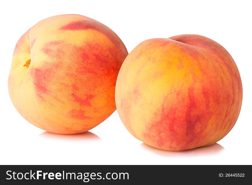 Ripe peaches fruit on white background