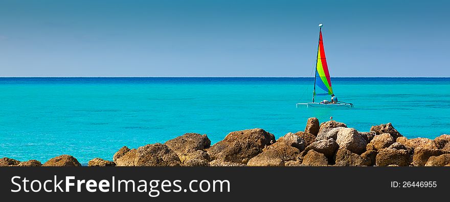 Small Sail Boat On The Caribbean