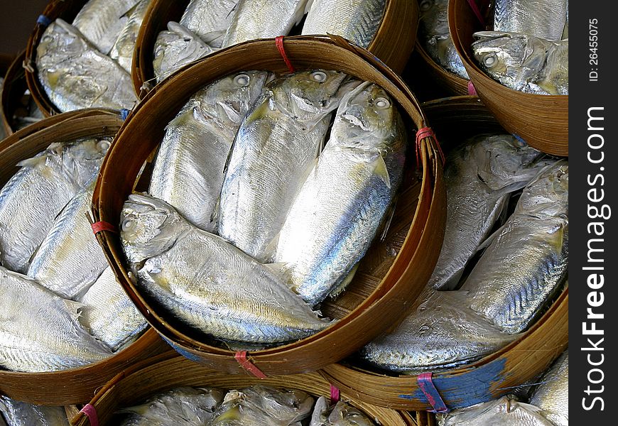Steamed mackerel fish on the bamboo round basket seafood in cheap price from seafood market