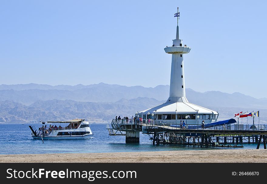 View on the Red Sea and tower of underwater observatory near Eilat, Israel. View on the Red Sea and tower of underwater observatory near Eilat, Israel