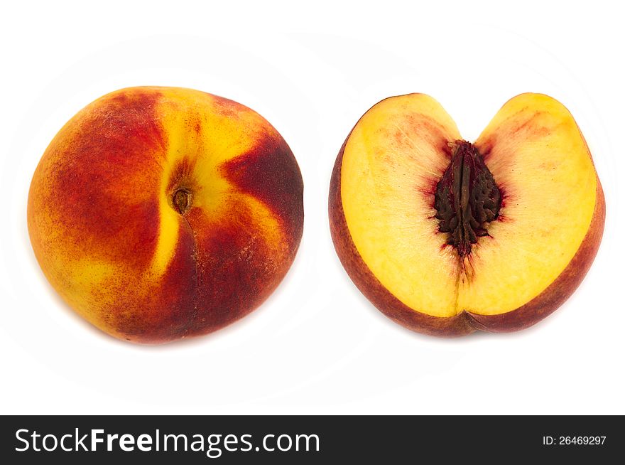 Ripe peach fruit on a white background. Ripe peach fruit on a white background