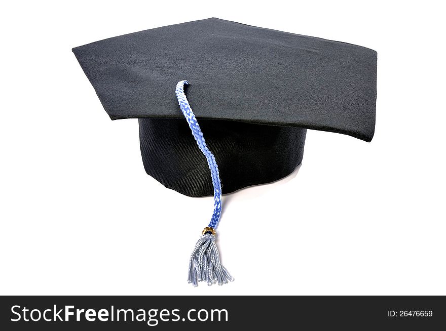Graduation cap with blue tassel isolated over white background