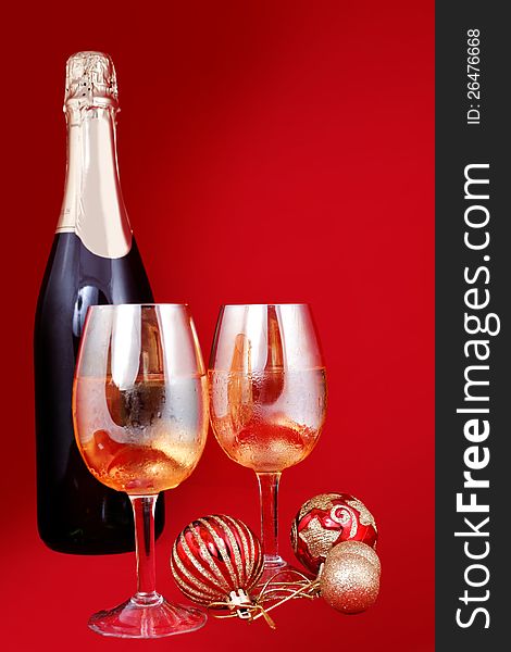Glasses with champagne red background