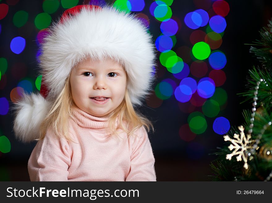 Christmas happy kid over bright festive background
