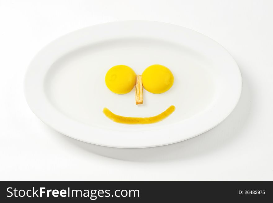 Images 2 pieces large egg yolk derived from a single egg. its shape resembles a smile faces. Images 2 pieces large egg yolk derived from a single egg. its shape resembles a smile faces.