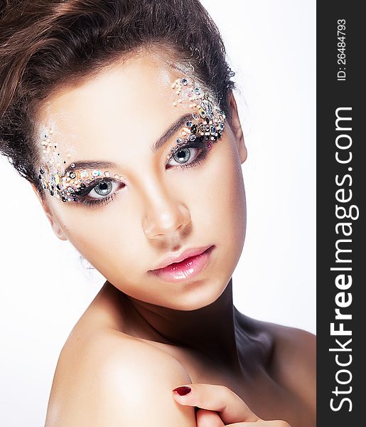 Fashion woman model with beauty bright make-up. Beautiful female face with clean skin. Fashion woman model with beauty bright make-up. Beautiful female face with clean skin