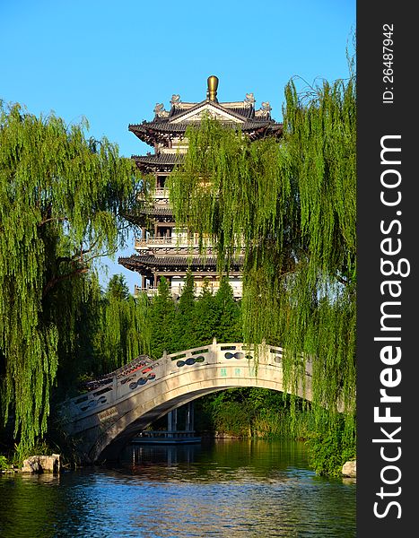 The Pagodas, the stone bridge, and the willows make up a beautiful picture.Taken in Jinan City, China. The Pagodas, the stone bridge, and the willows make up a beautiful picture.Taken in Jinan City, China