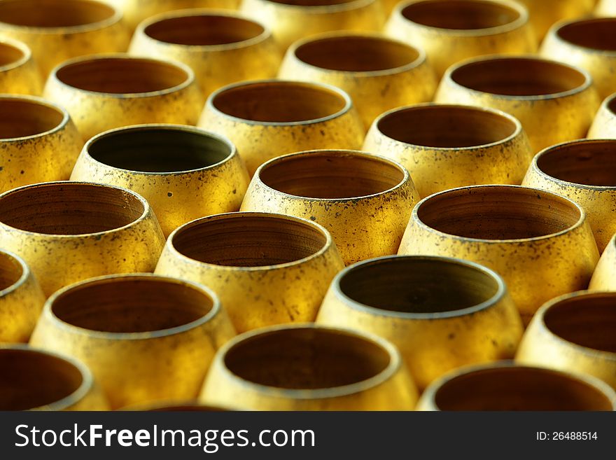 Mini monk's alms bowl for donate some coins usually found in Thai temple. Mini monk's alms bowl for donate some coins usually found in Thai temple