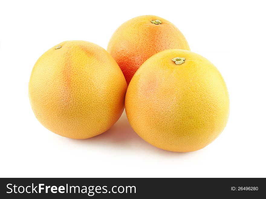 Three nice and tasty grapefruits on white background. Three nice and tasty grapefruits on white background