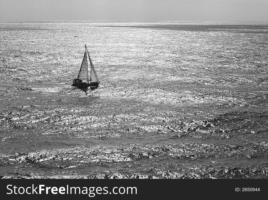 Lonely yacht sailing near San Diego, California.