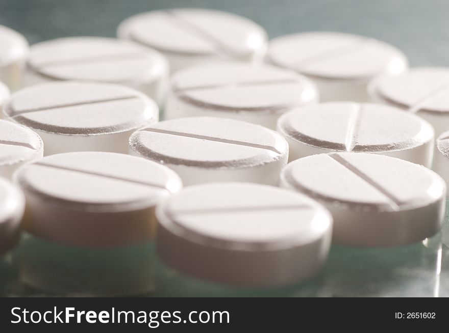 Close up of white pills. Close up of white pills