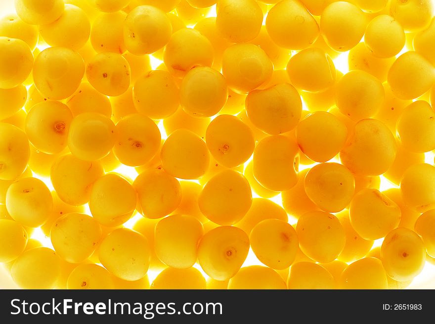 A sweet yellow cherries background