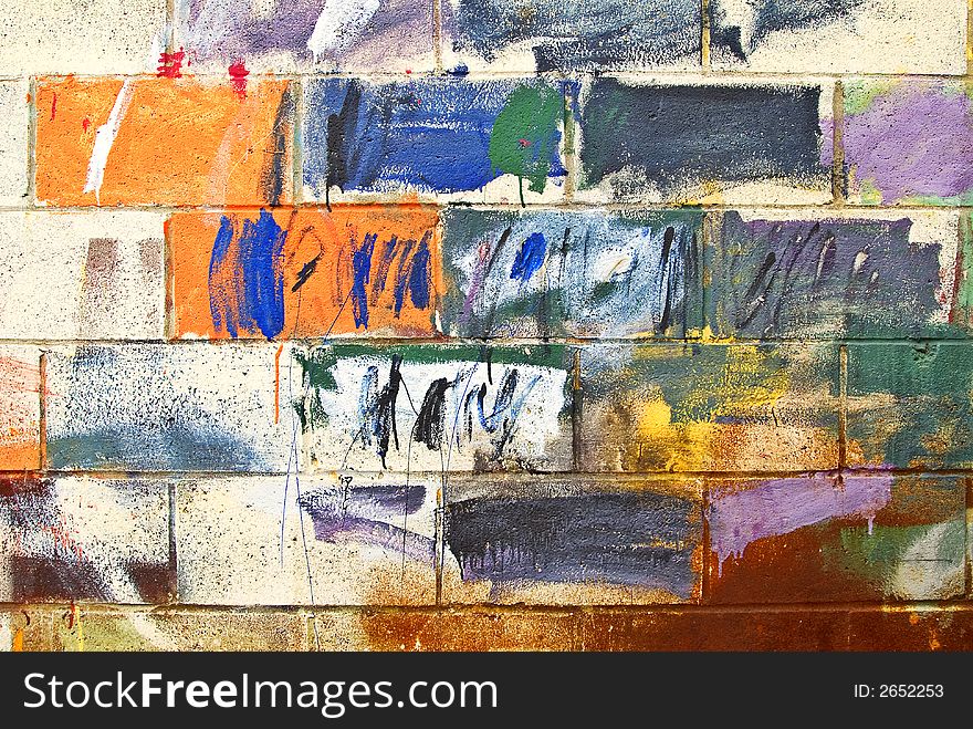 Cement brick wall painted with many colors. Cement brick wall painted with many colors