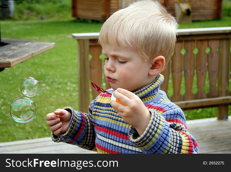 Boy Making Bubbles