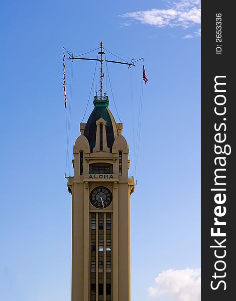 Top of Aloha Tower marking the arrival at Honolulu harbor in Hawaii