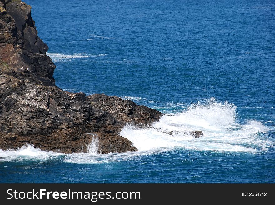 Waves breaking on the rocks. Waves breaking on the rocks