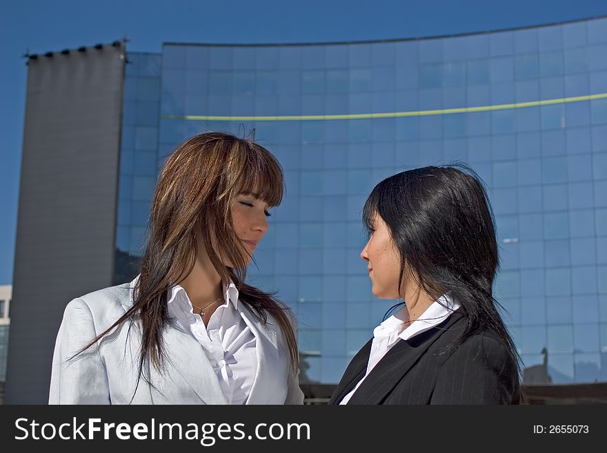 Portrait of two young women being opposed Face to face. Portrait of two young women being opposed Face to face