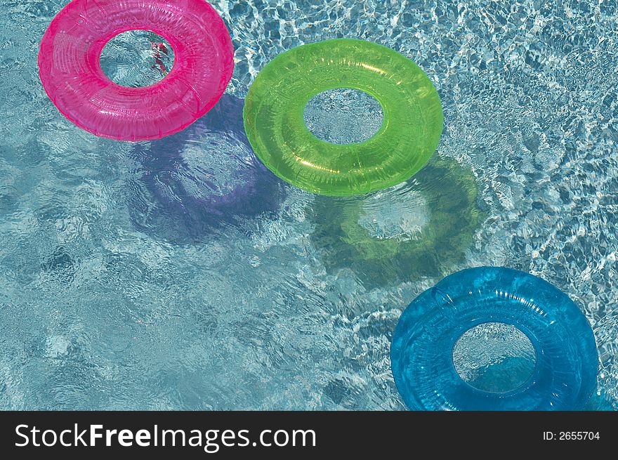 Round float in pool of water. Round float in pool of water