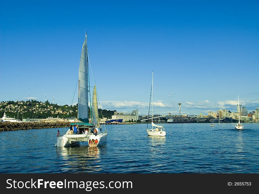 Sailboats on Elliott Bay in downtown Seattle, WA. Sailboats on Elliott Bay in downtown Seattle, WA