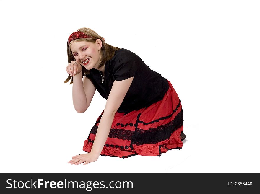 A pretty young teen crouching in a cat like pose. A pretty young teen crouching in a cat like pose