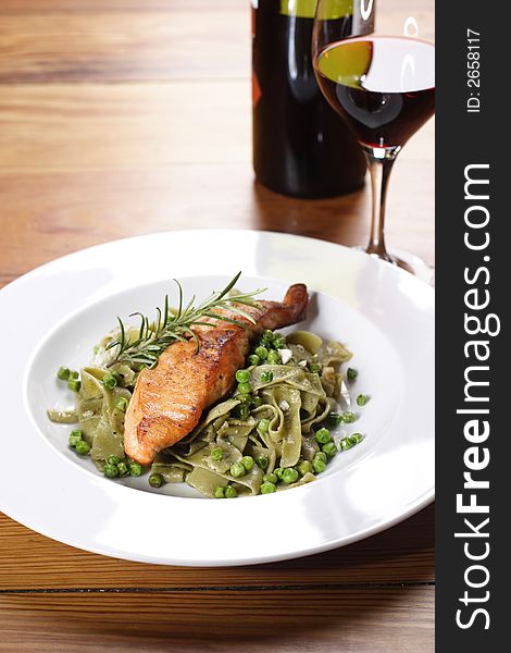 Salmon with wild garlic pasta