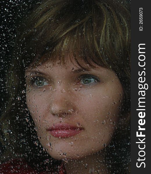 Girl Behind Waterdropped Glass