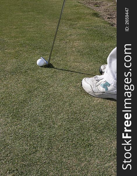 Golfer putting