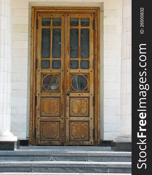 Ancient architecture entrance with old wooden door