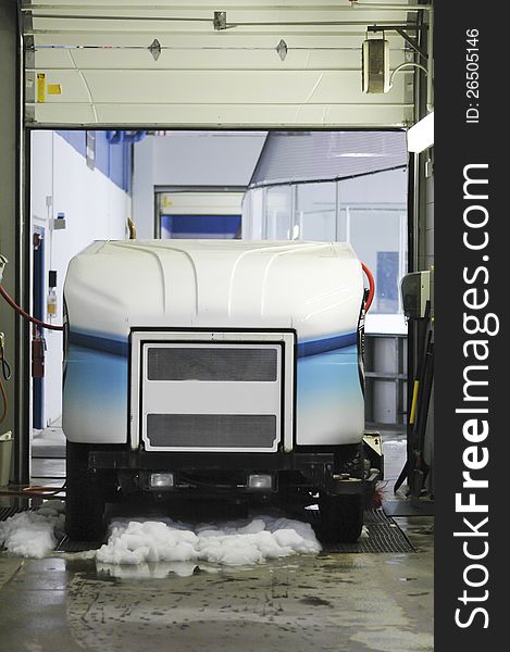 Ice resurfacing machine in garage