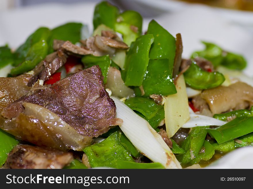 Fried meat with green chili