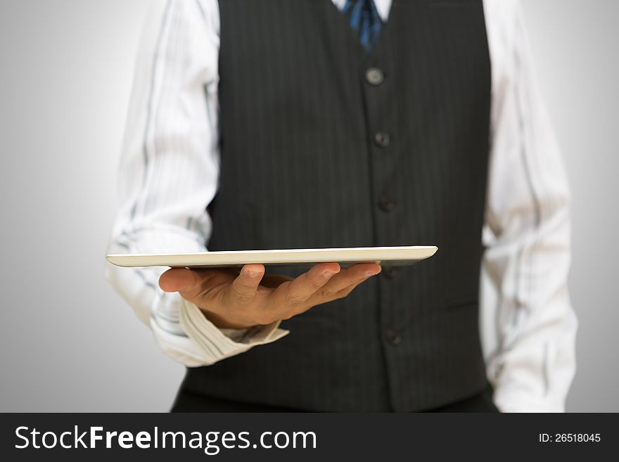 Businessman holding a digital tablet