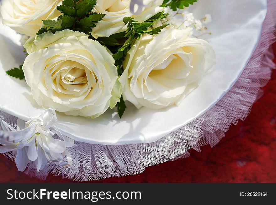 Part of a wedding arrangement of bridal bouquet basket
