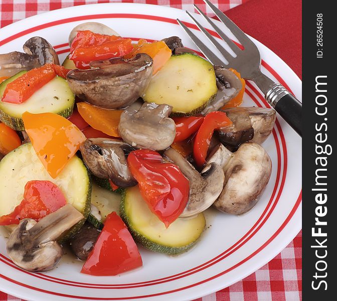 Sauted red and orange peppers, mushrooms and zucchini. Sauted red and orange peppers, mushrooms and zucchini