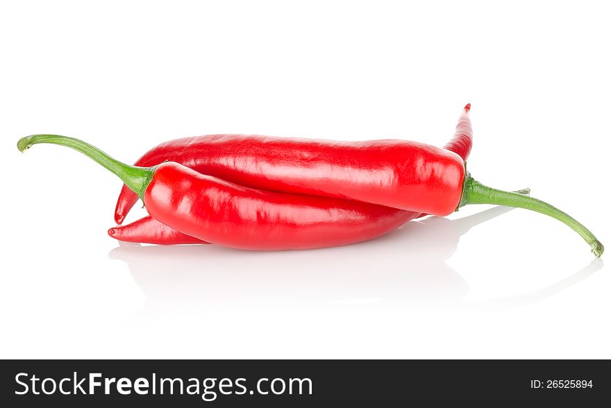 Three chili peppers isolated on a white background