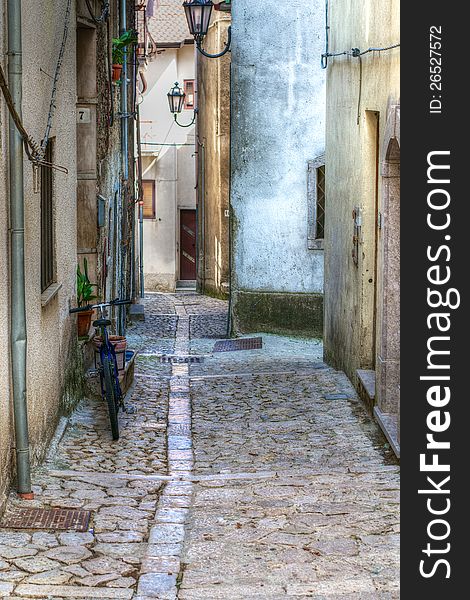 Narrow alley in Castelvetere sul Calore, a mountain village in Campania, Italy. Narrow alley in Castelvetere sul Calore, a mountain village in Campania, Italy