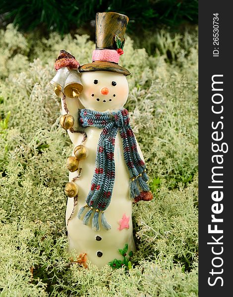 Jolly snowman, Christmas ornament with background of lichen. Jolly snowman, Christmas ornament with background of lichen