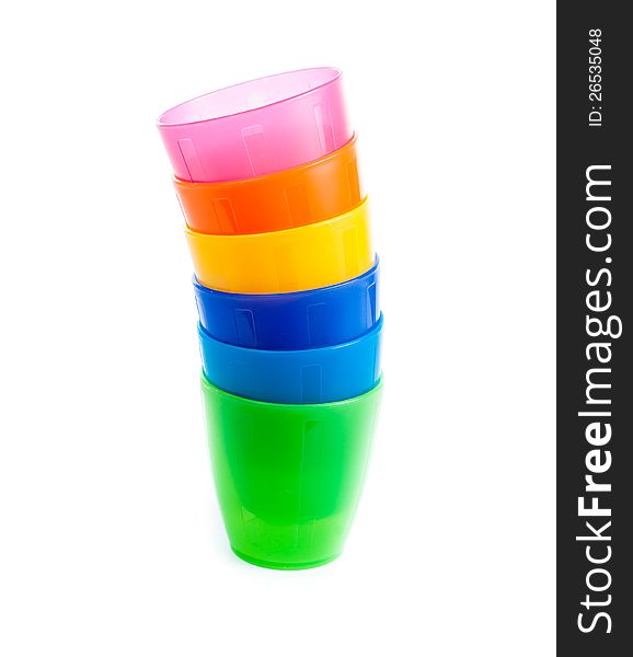 Stack of colorful plastic cups isolated