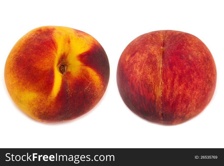 Ripe peach fruit on a white background. Ripe peach fruit on a white background