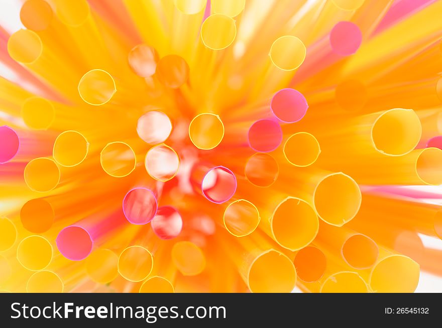 A bunch of multicolored drinking straws