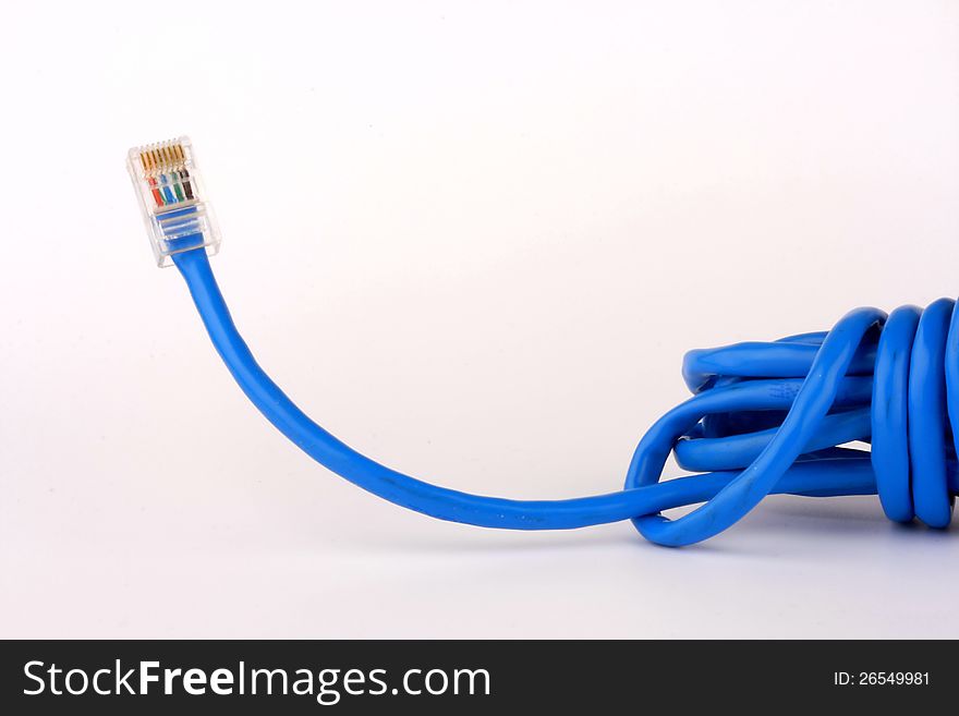 Blue network cable connector on white background