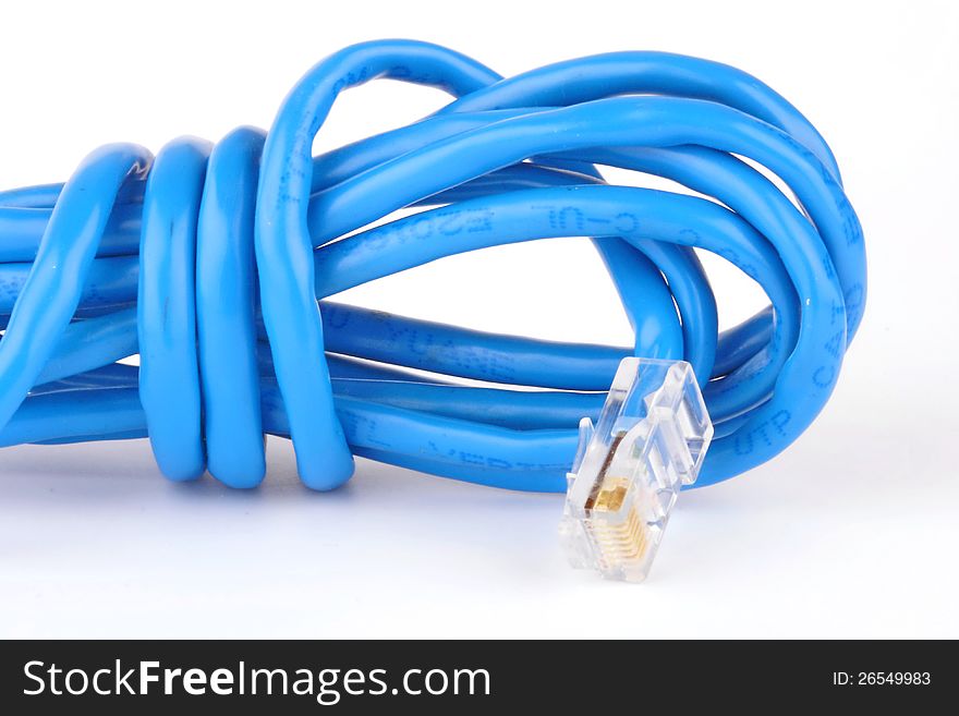 Blue network cable and connector on white background